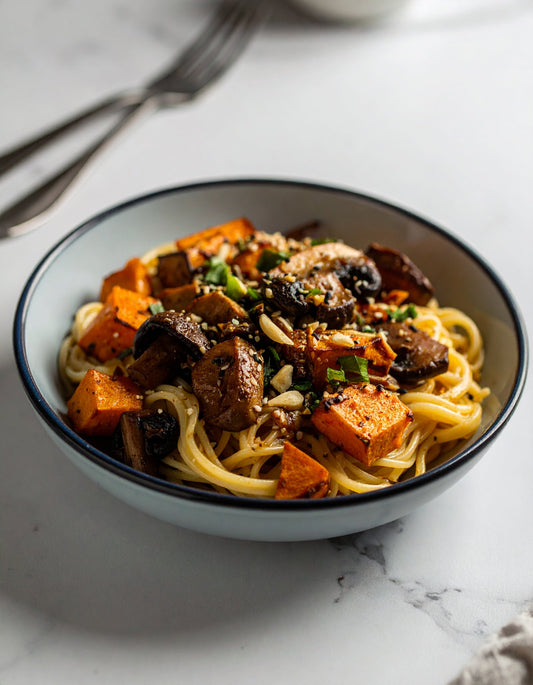 Creamy Cashew Butter Noodles with Sweet Potato, Shiitake Mushrooms, Garlic, and White Miso
