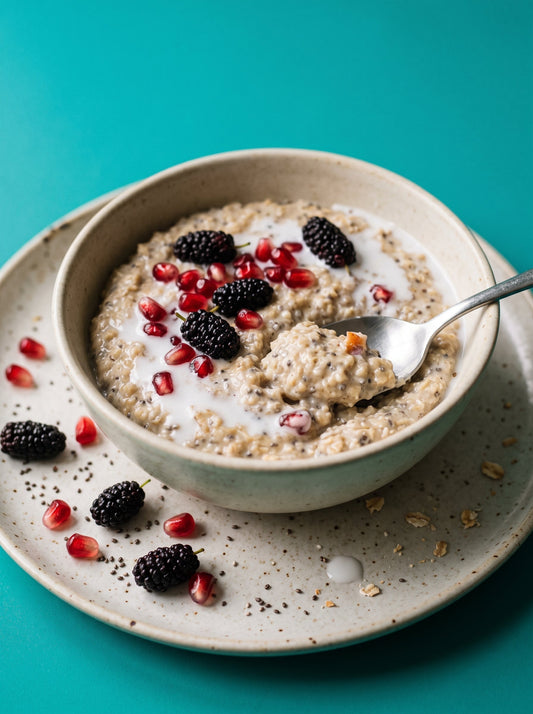 Sprouted Oat and Chia Porridge with Coconut Milk, Mulberries and Pomegranate